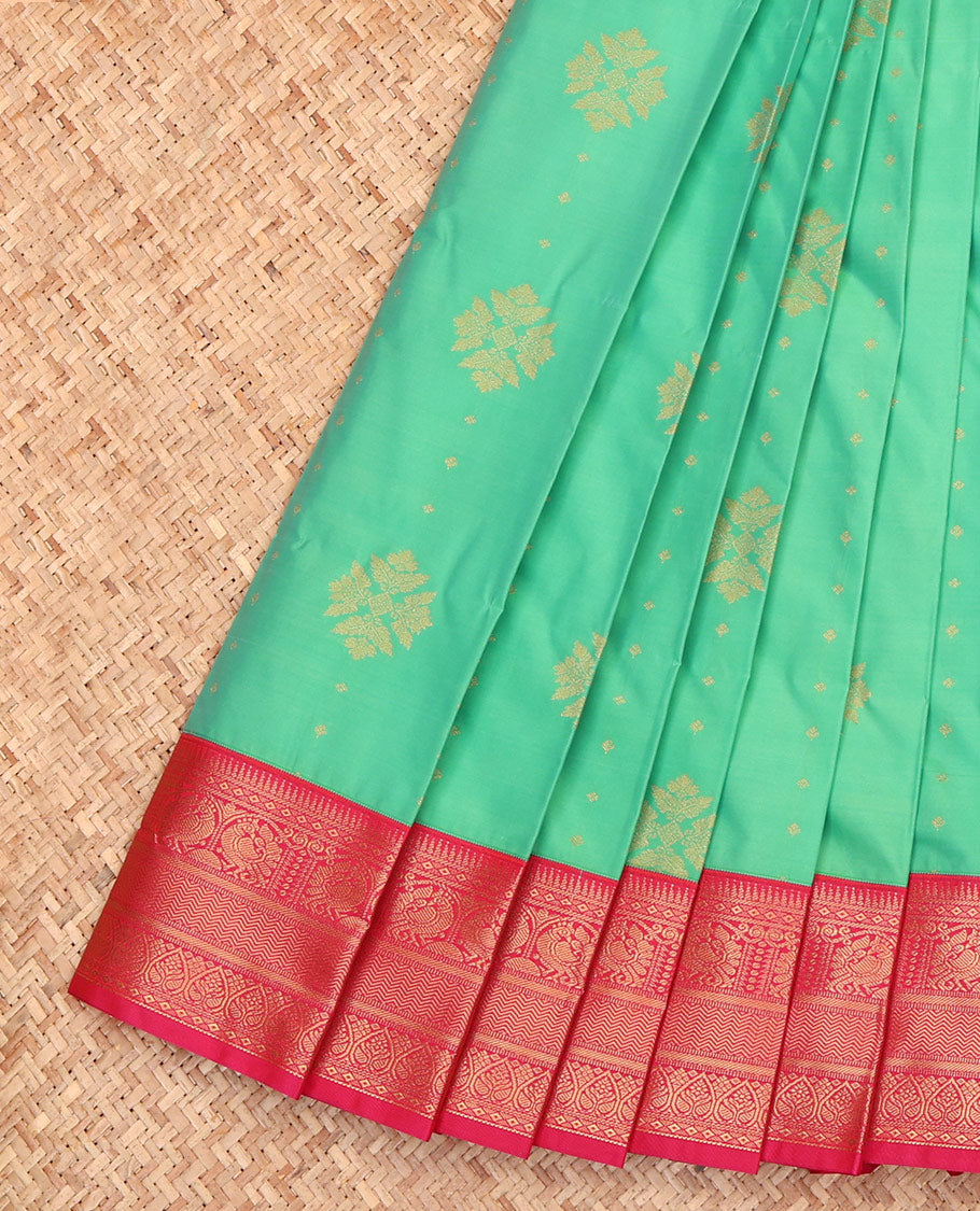 Green Budget Silk Saree, Embellished with Zari Buttas, a Contrast Traditional Zari Border, Grand Pallu, and a Contrast Blouse
