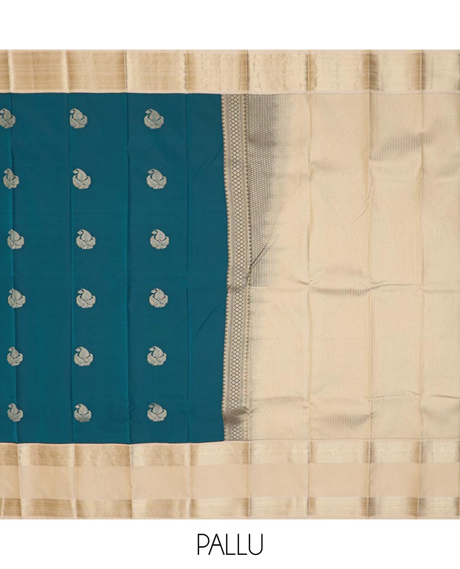 Peacock Blue Budget Silk Saree Graced with Leaf Buttas All Over Its Body, Complemented by a Contrast Traditional Zari Design Rettai Pettu Border, Subtly Pallu of Jaal Design, and Paired with a Contrast Blouse