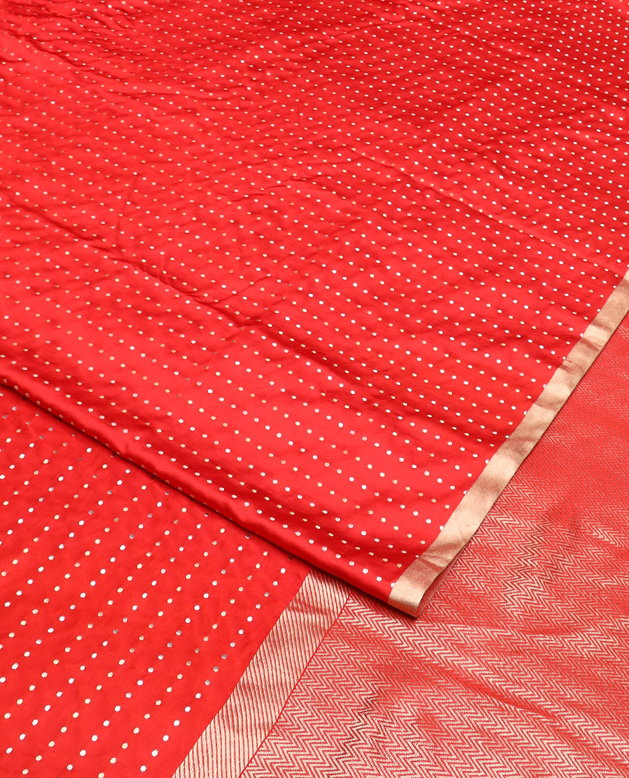 Dazzling red dobbly style dotted banarasi silk saree, piping zari border, and chevron striped pallu