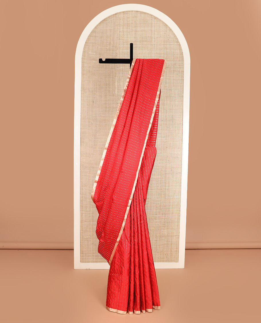 Dazzling red dobbly style dotted banarasi silk saree, piping zari border, and chevron striped pallu