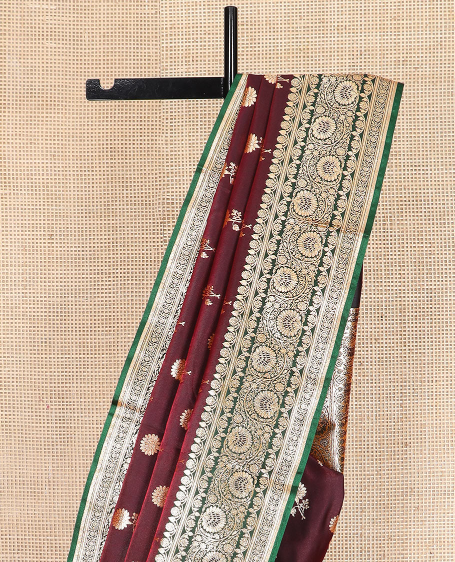 Maroon floral buttas banarasi silk saree, contrast floral creeper design border, and Mughal-style designs woven pallu
