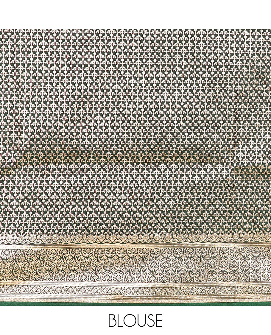 Maroon floral buttas banarasi silk saree, contrast floral creeper design border, and Mughal-style designs woven pallu