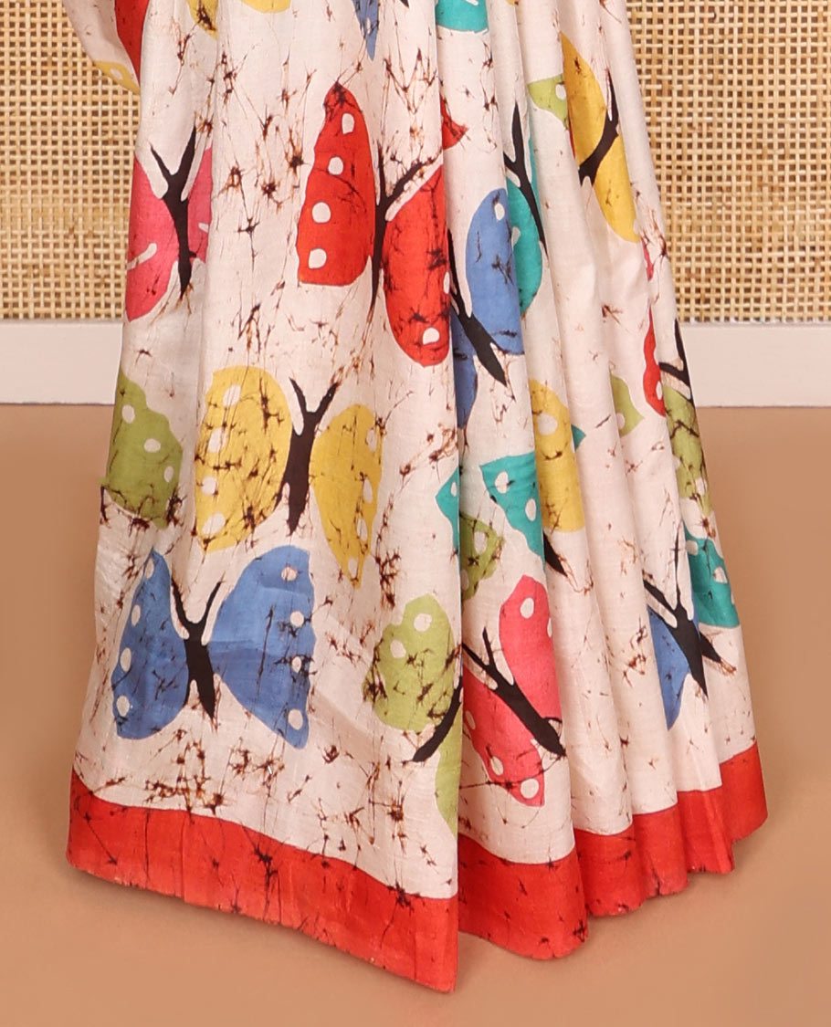 White butterfly motifs crepe saree with contrast border & peacock design pallu