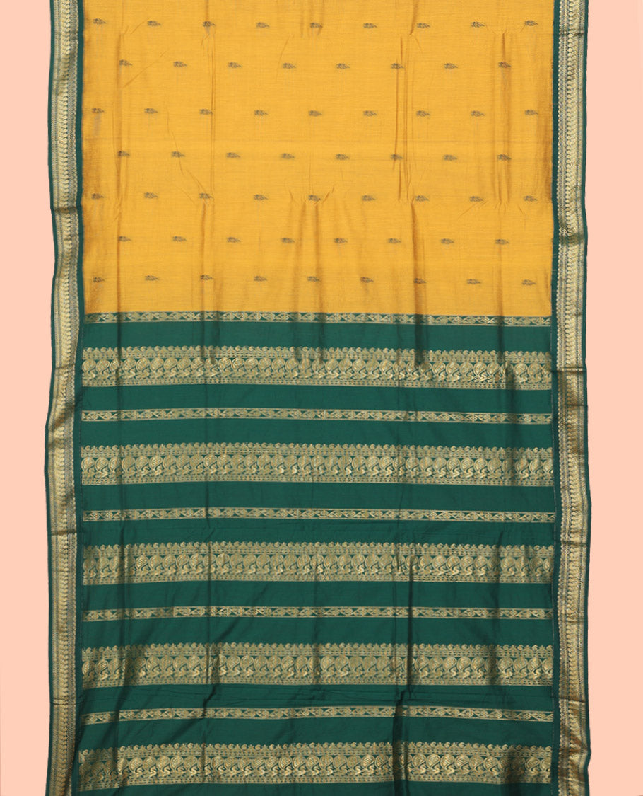 Mustard Nine Yard Cotton Saree, Subtly Sparkled with Buttas All Over Its Body, Complemented by Contrast Traditional Zari Design Border, Pallu of Traditional Designs, and Comes Without a Blouse