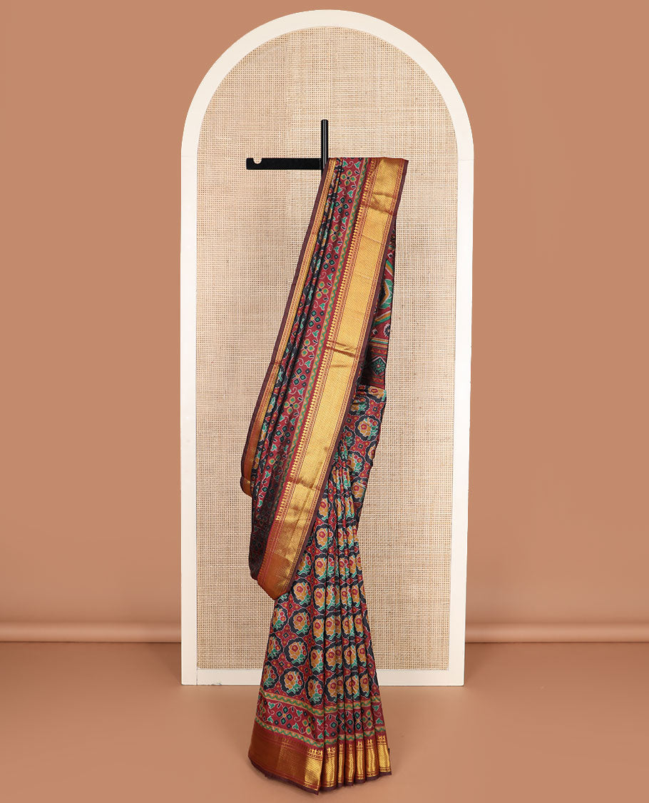 Black ikkat design semi-banaras patola silk saree, traditional zari design border, and ikkat design pallu