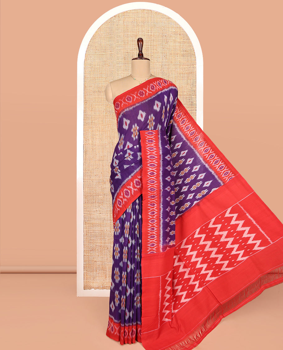 Violet Ikkat Cotton Saree, Showcasing Ikkat Buttas All Over Its Body, Complemented by a Contrast Ikkat-Style Border, Chevron Striped Pallu, and Paired with a Contrast Blouse