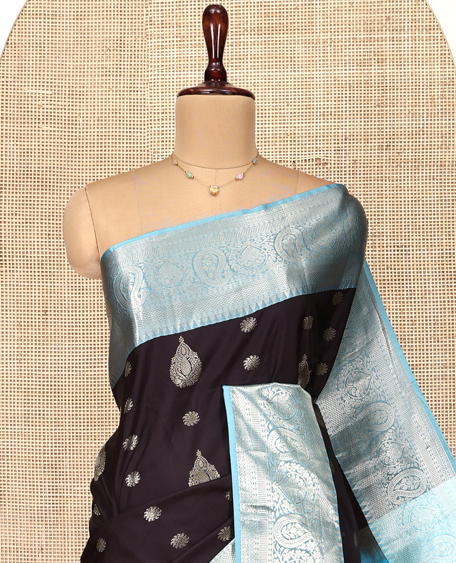 Black and Light Blue Budget Silk Saree, Ornamented with Zari Buttas on Its Body, Complemented by a Contrast Traditional Zari Design Border of Paisleys, Pallu Steeped with Paisley Designs, and Paired with a Contrast Blouse