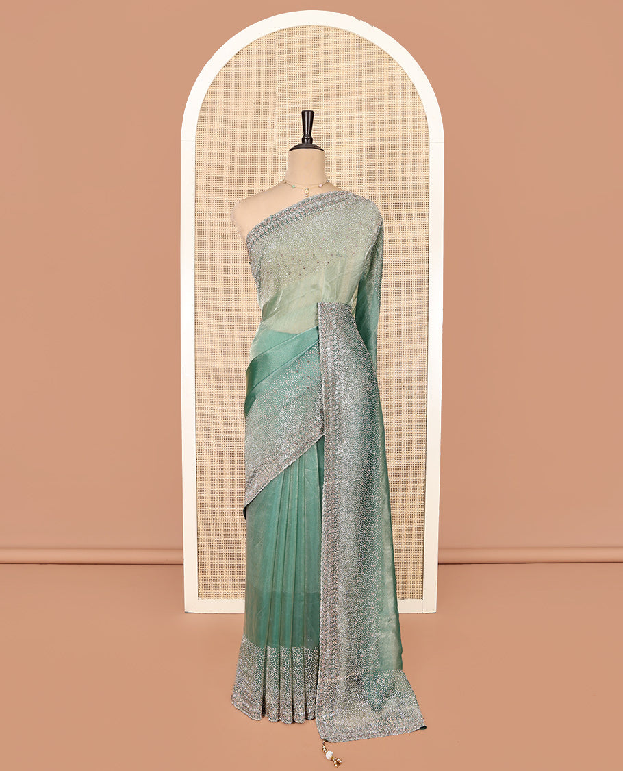 Emerald Green Fendi Silk Saree with Swarovski Stonework Border, and a Stonework Blouse