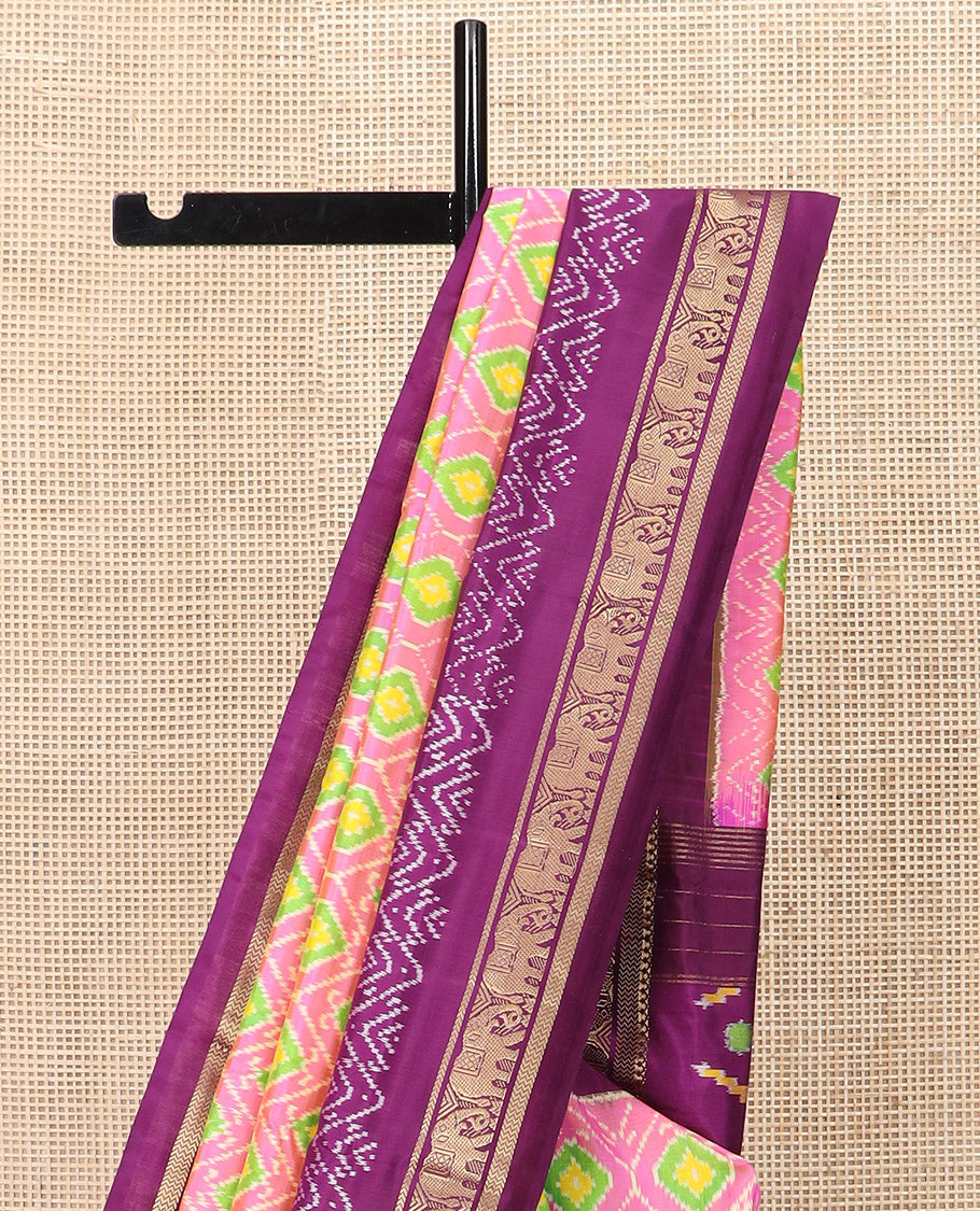 Candy Pink Ikkat Silk Saree Adorned with Ogee Patterns, Complemented by a Contrasting Elephant Zari Border, a Hazily Woven Pallu of Intricate Patterns, and a Contrasting Blouse