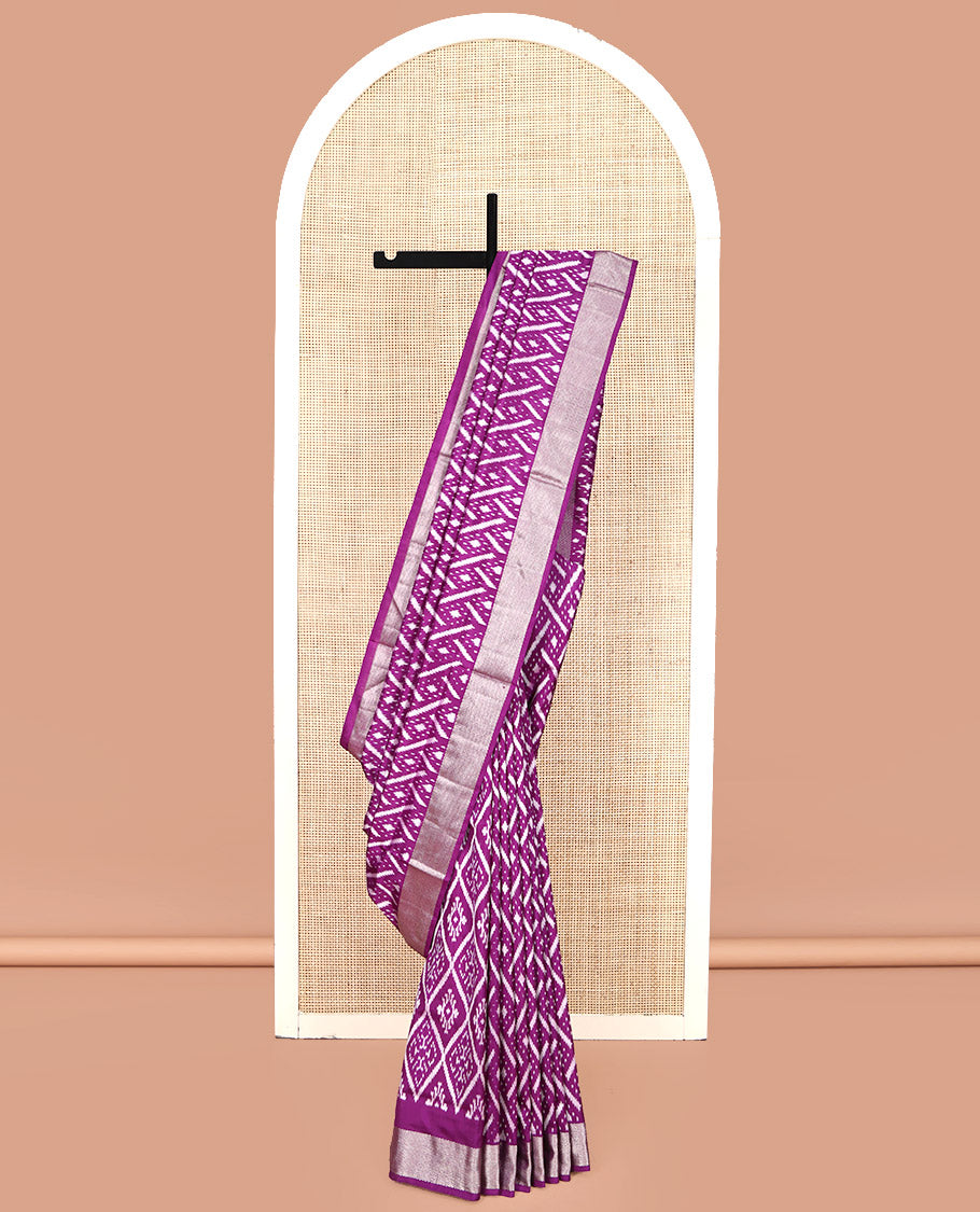 Purple Pochampally Ikat Silk Saree, Accentuated with Ikat Geometric Designs on Its Body, Highlighted by a Zari Chevron Border, Pallu of Ogee Pattern in Ikkat Weave, and Paired with a Matching Blouse