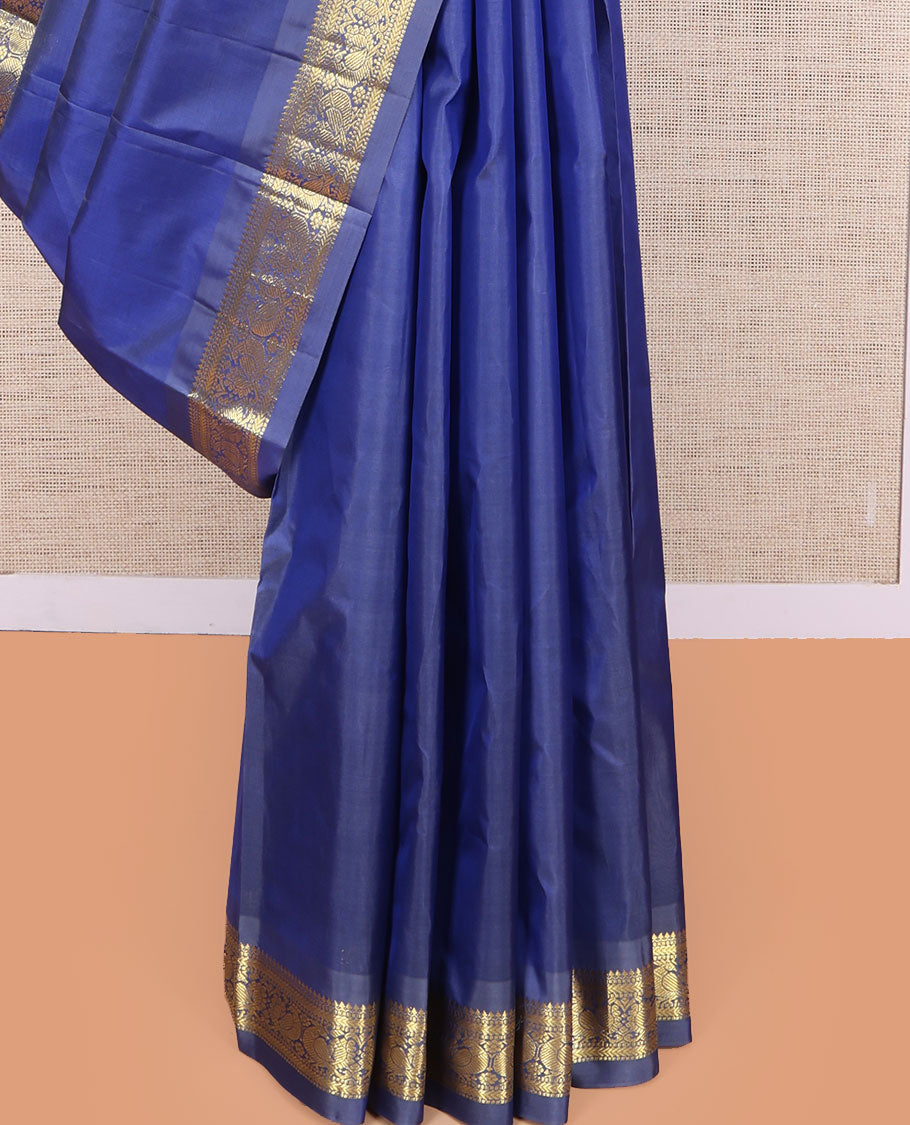 Blue Kanchipuram Silk Saree, Enriched with Zari Buttas, a Semi-Contrast Zari Border, Zari Design Pallu, and a Matching Blouse