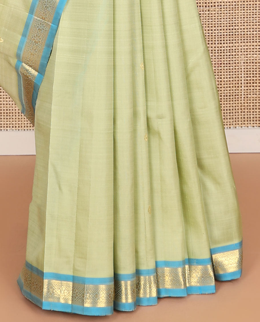 Green floral design kancheepuram silk saree with contrast floral design border & intricate zari desogn pallu