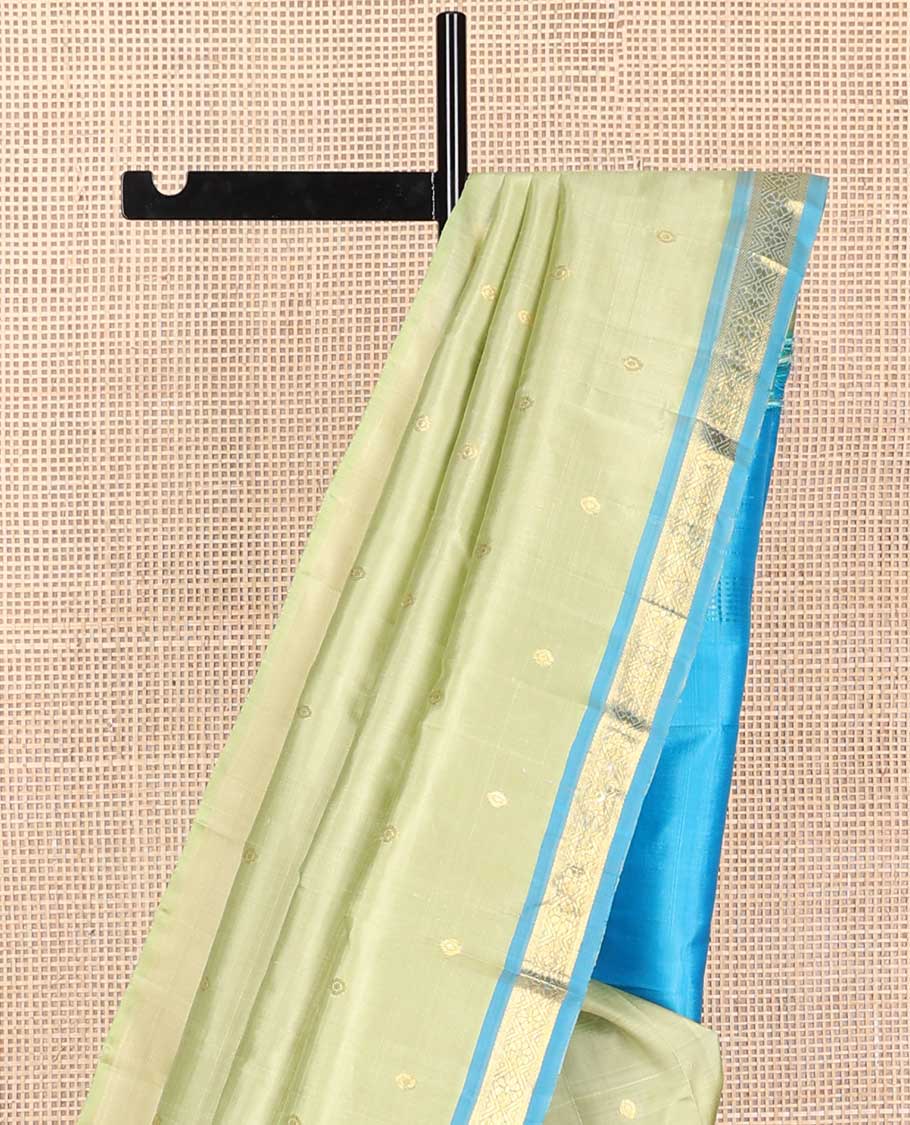Green floral design kancheepuram silk saree with contrast floral design border & intricate zari desogn pallu