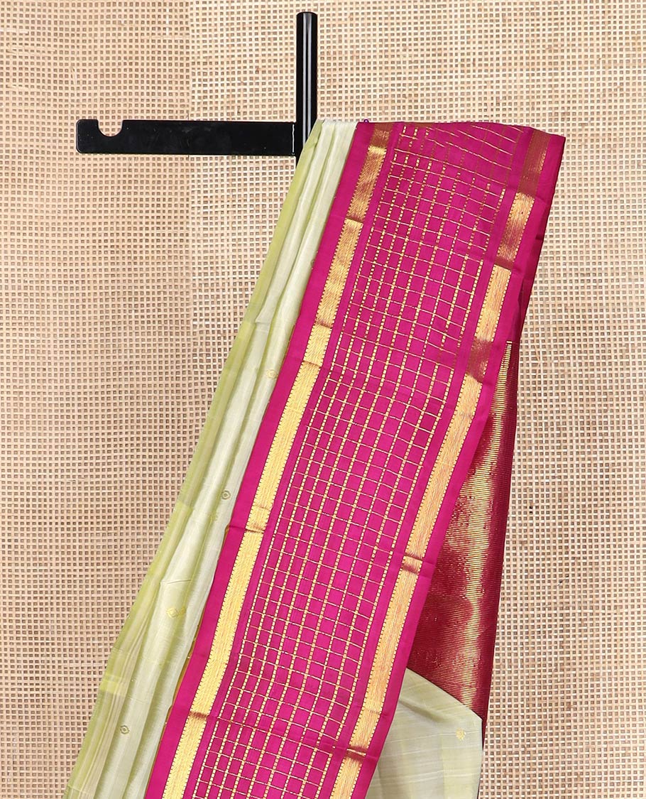 Green zari buttas kanchipuram silk saree, contrast one-sided thazampoo rekku muthu kattam zari border & pillaiyar mokku pallu