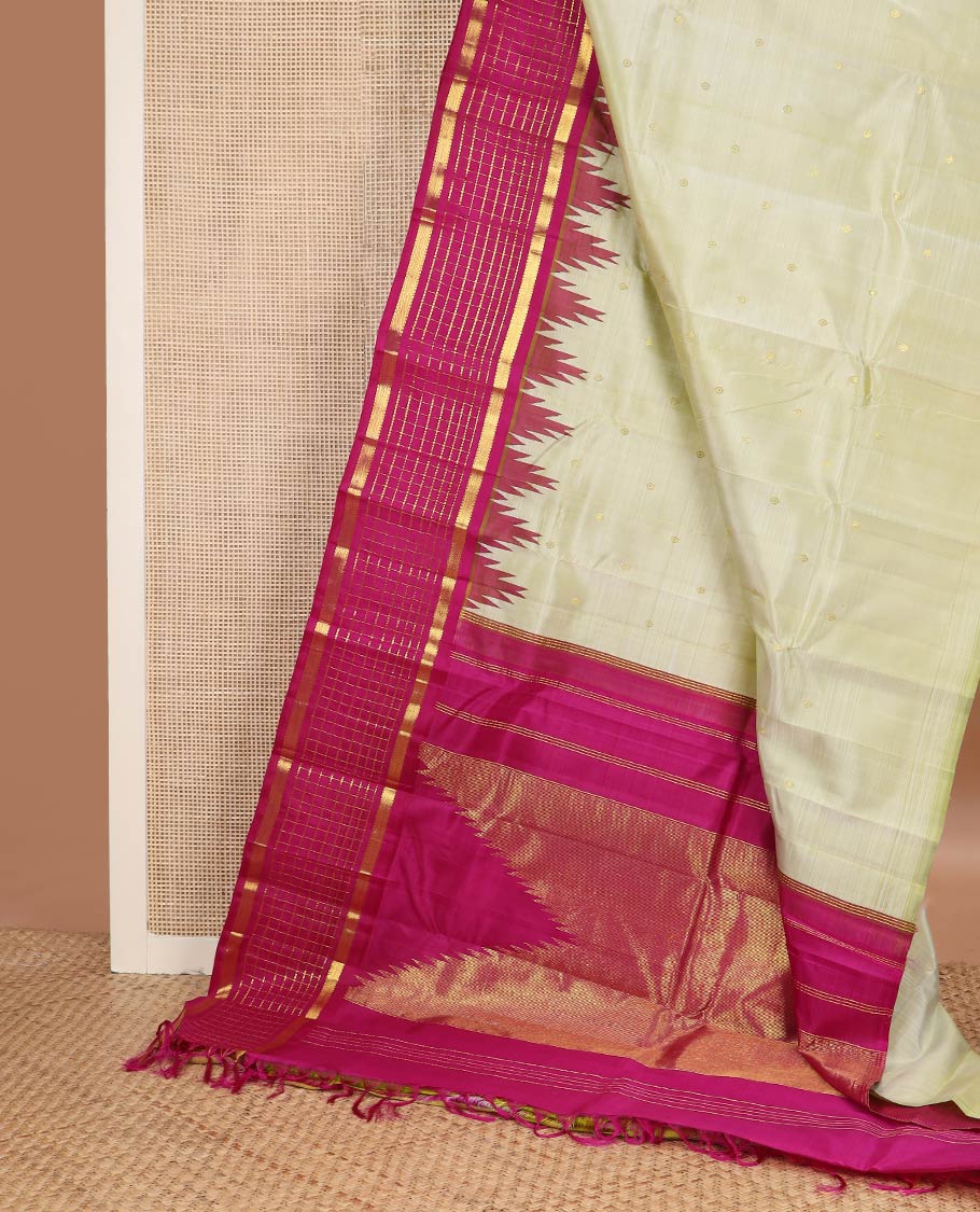 Green zari buttas kanchipuram silk saree, contrast one-sided thazampoo rekku muthu kattam zari border & pillaiyar mokku pallu