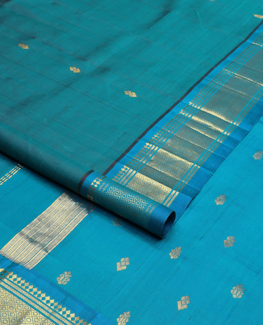 Blue zari buttas Kanchipuram silk saree, contrast border of paneer sombu, banaras & mayil kann & zari design pallu