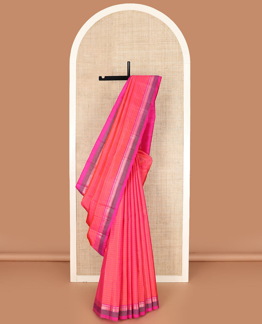 Pink striped Kanchipuram silk saree, contrast border of salngai, banaras, and kuyil kann designs, and zari striped pallu