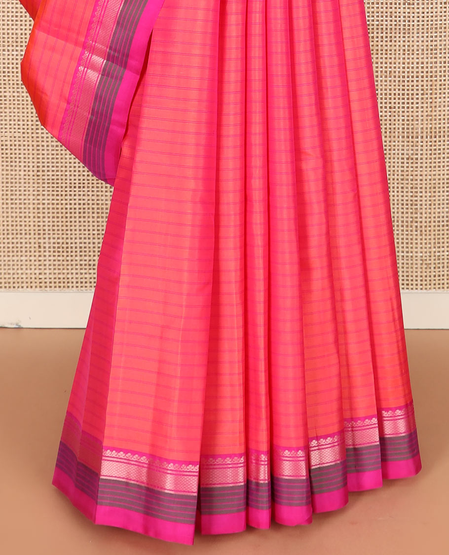 Pink striped Kanchipuram silk saree, contrast border of salngai, banaras, and kuyil kann designs, and zari striped pallu