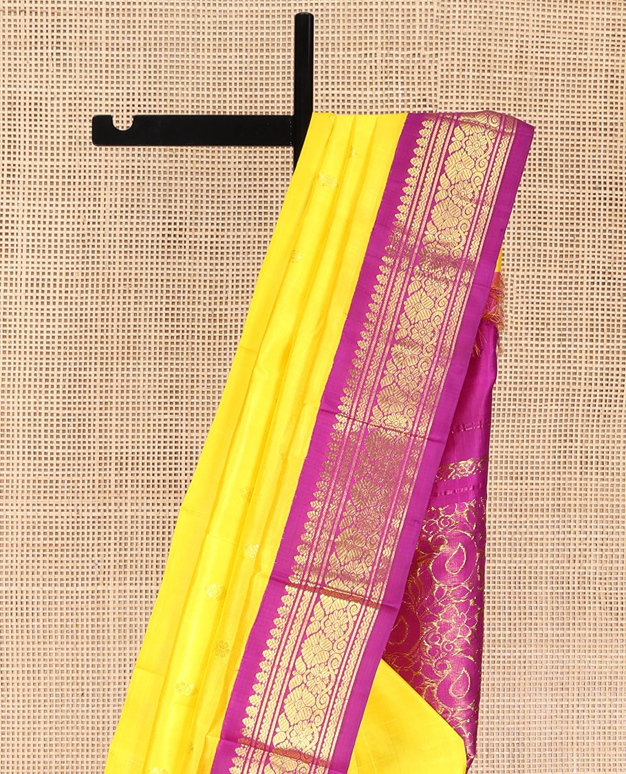 Yellow Kanchipuram Silk Saree, Mesmerized with Zari Buttas, Complemented by Contrast One-Sided Korvai Border of Banaras and Rettai Neli Designs, Pallu of Paisley and Floral Designs, and Comes Without a Blouse