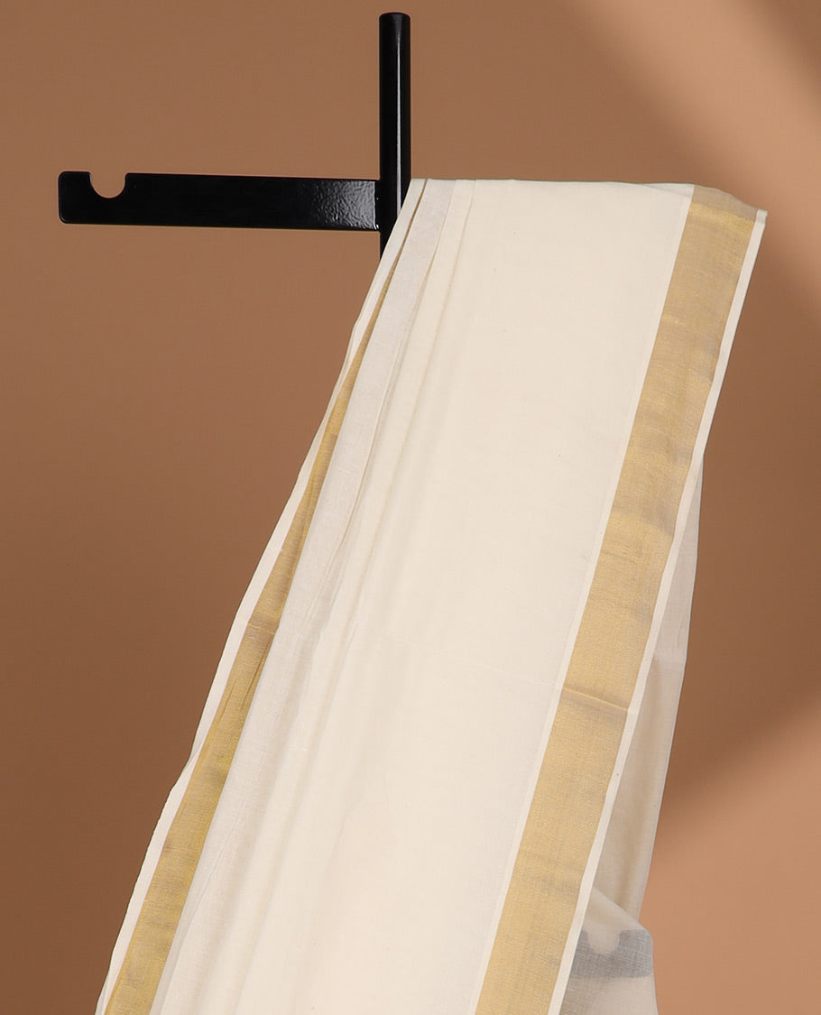 Cream plain design kerala saree, zari border & pallu of zari designs