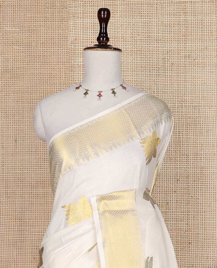 Cream zari Pichwai lotus buttas Kerala saree, traditional zari temple border, and pallu of zari designs