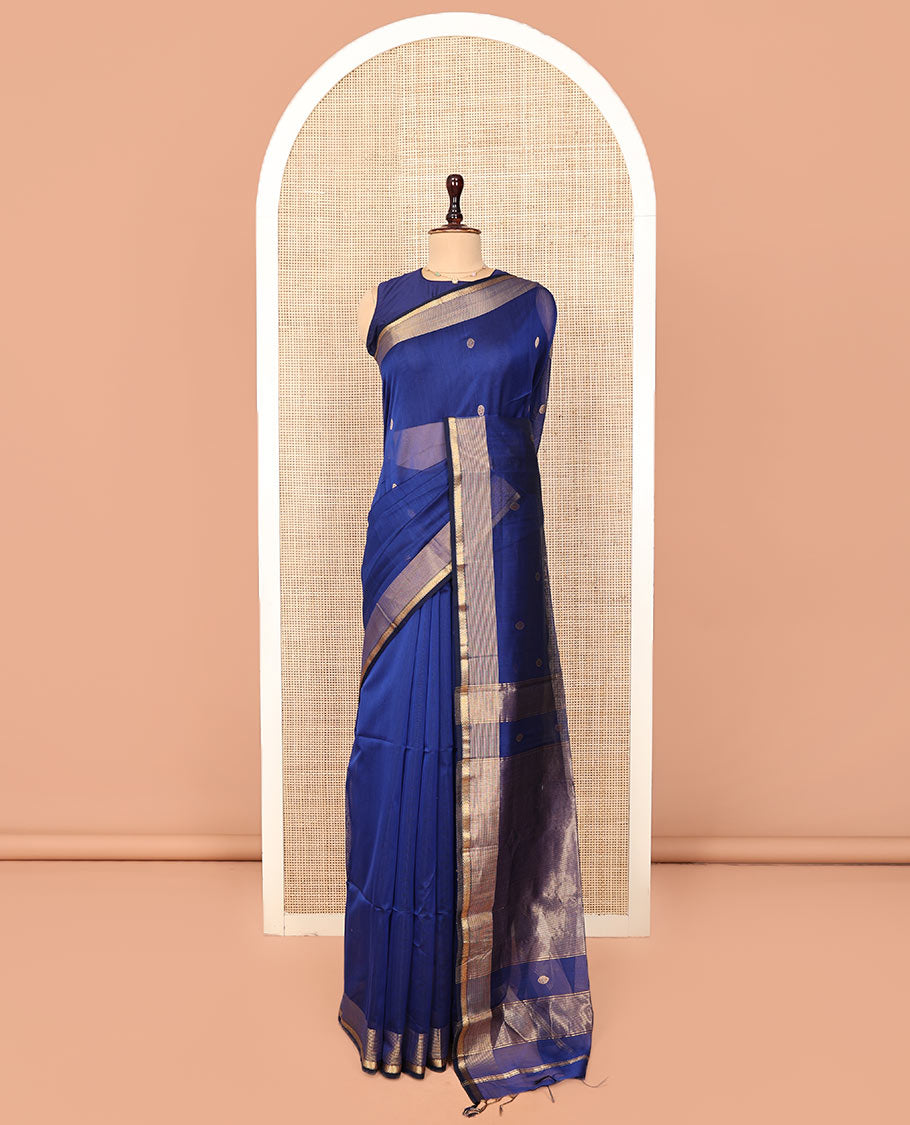Blue Plain Maheshwari Cotton Saree, Mesmerized with Buttas All Over Its Body, Highlighted by a Zari Border of Traditional Designs, Gleaming Pallu Steeped with Zari Stripes, and Paired with a Matching Blouse