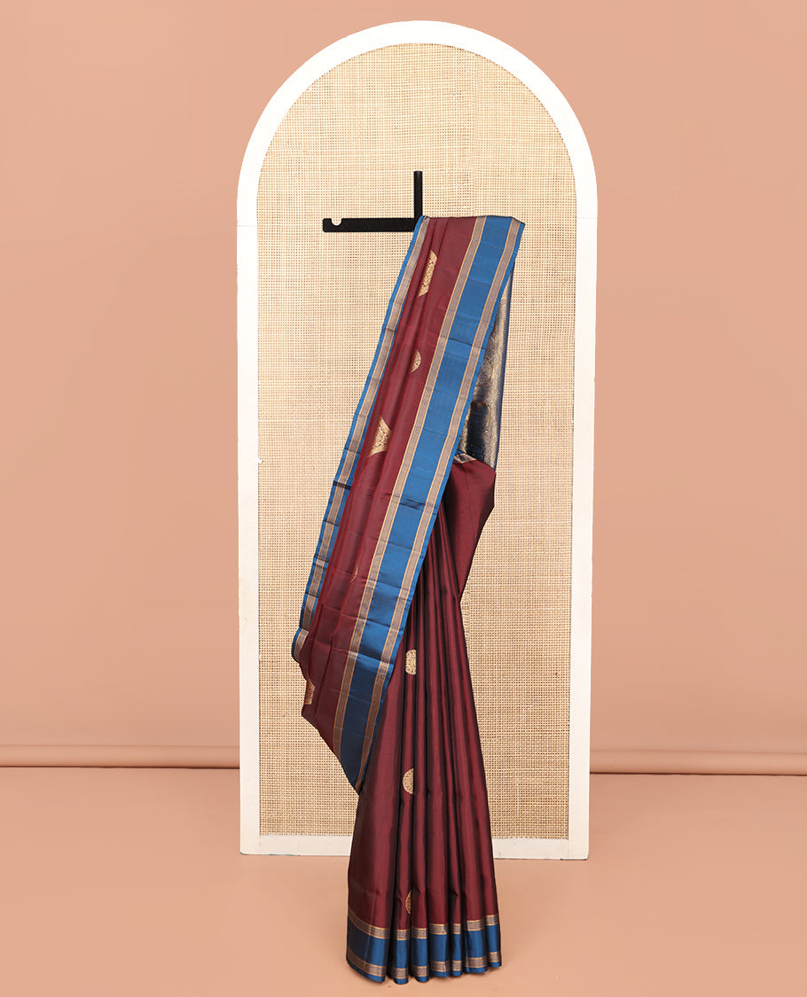 Maroon Mayuri Lite Silk Mix Saree, Gracefully Embellished with Zari Buttas, a Contrast Zari Border, Intricate Pallu, and a Contrast Blouse