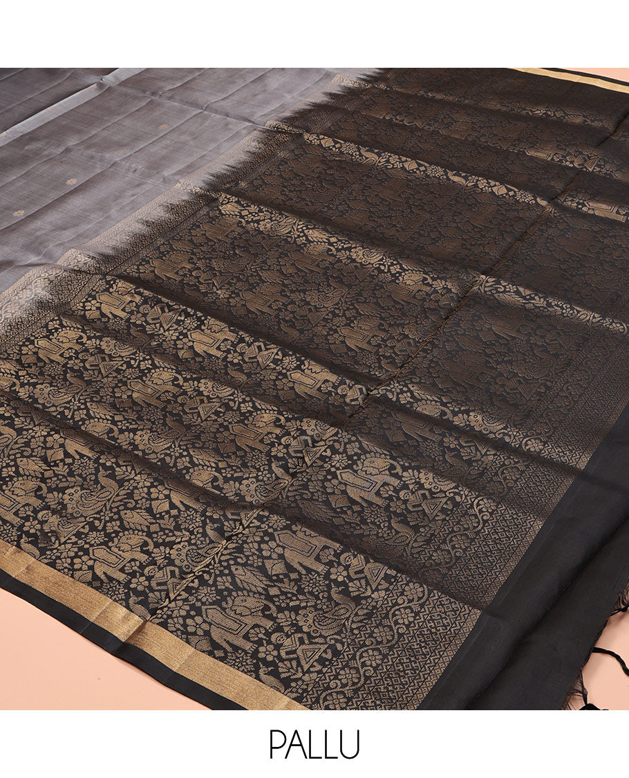 Grey Mayuri Soft Silk Saree, Subtly Sparkled with Zari Buttas, a Contrast Tribal-Themed Woven Border, Pallu of Forest-Themed Designs, and Contrast Blouse