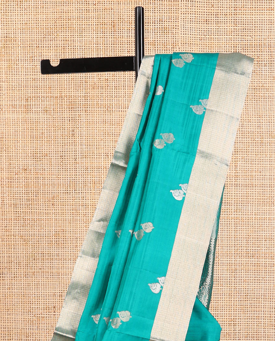 Sea blue floral design mayuri soft silk saree with contrast border & floral zari design pallu