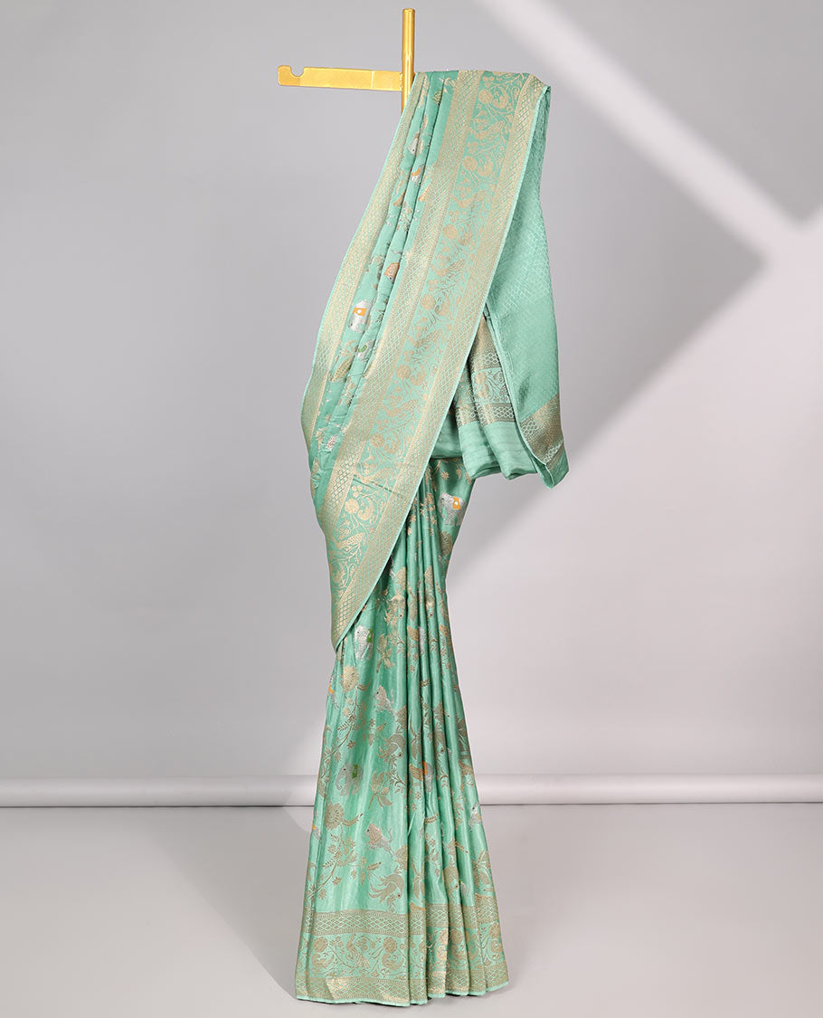 Green floral vine , animal design mushru silk saree with self-zari floral border & floral zari pallu