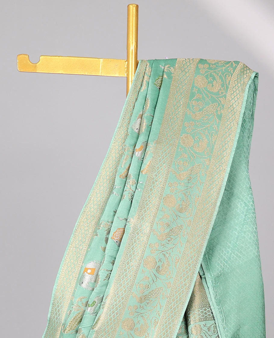Green floral vine , animal design mushru silk saree with self-zari floral border & floral zari pallu