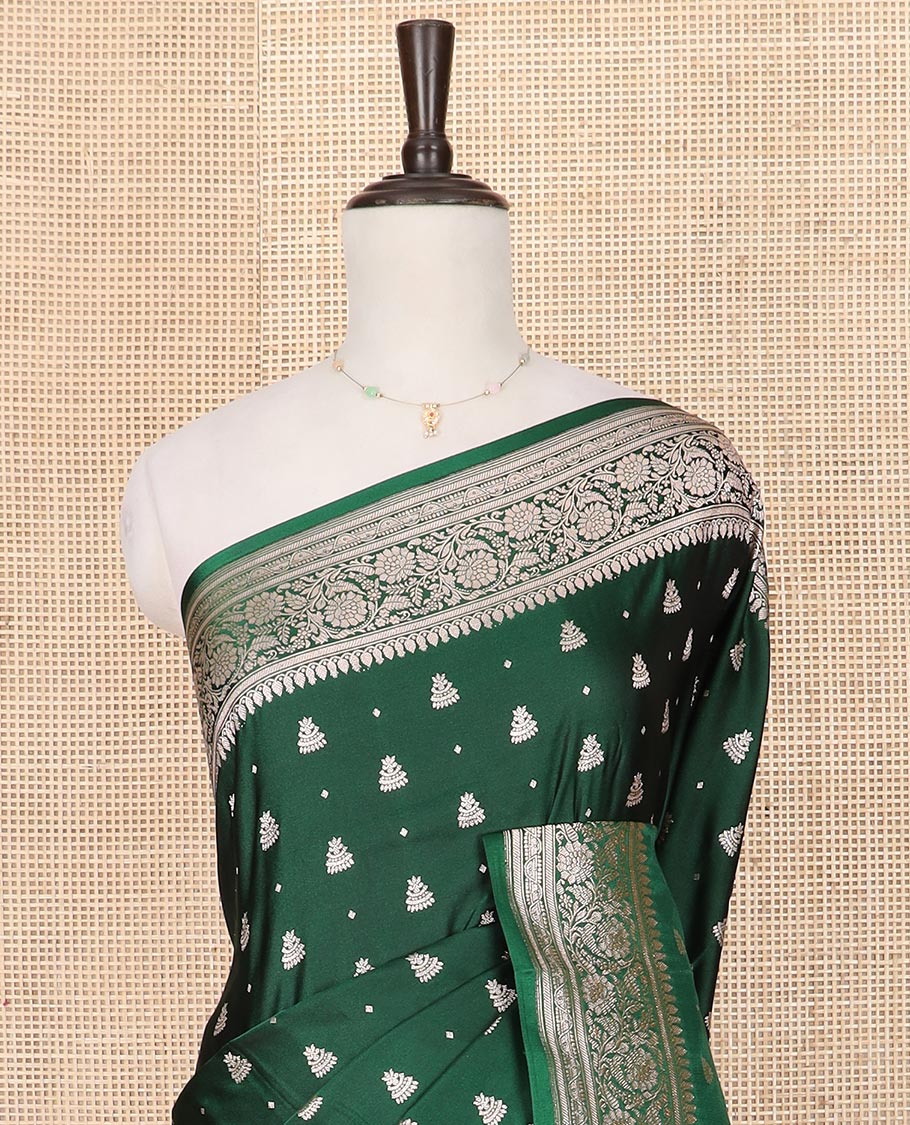Green zari buttas mushru silk saree, floral creeper design border, and intricately designed pallu