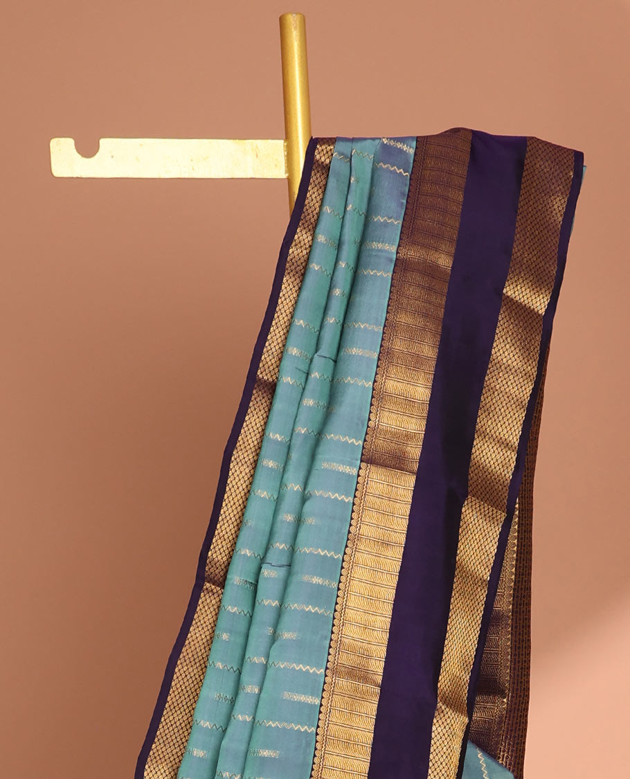 Light blue striped design vasundhara elite silk saree with contrast rettai pettu zari design border & intricate zari design pallu