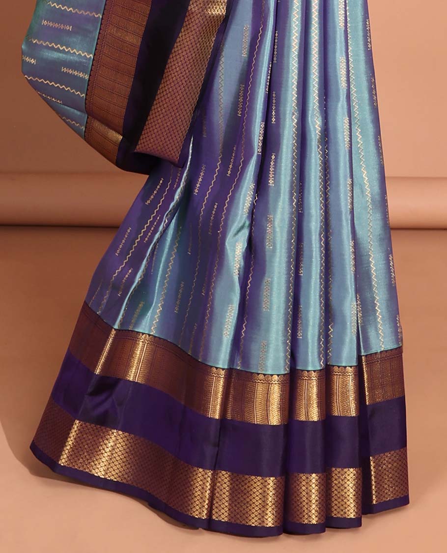 Light blue striped design vasundhara elite silk saree with contrast rettai pettu zari design border & intricate zari design pallu