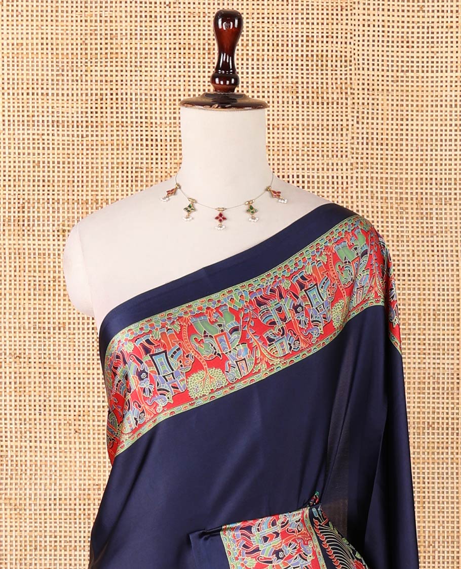 Navy blue plain gajji silk saree, double-sided position printed border & pallu of animal & human motifs, with floral printed blouse
