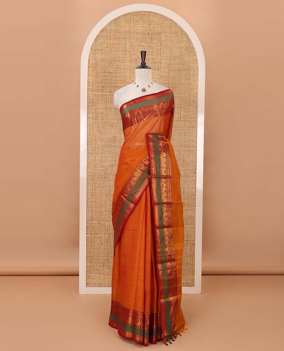 Grey plain Chettinad cotton saree, contrast zari border of temple, rudraksham & annam motifs, striped pallu & matching blouse of zari border