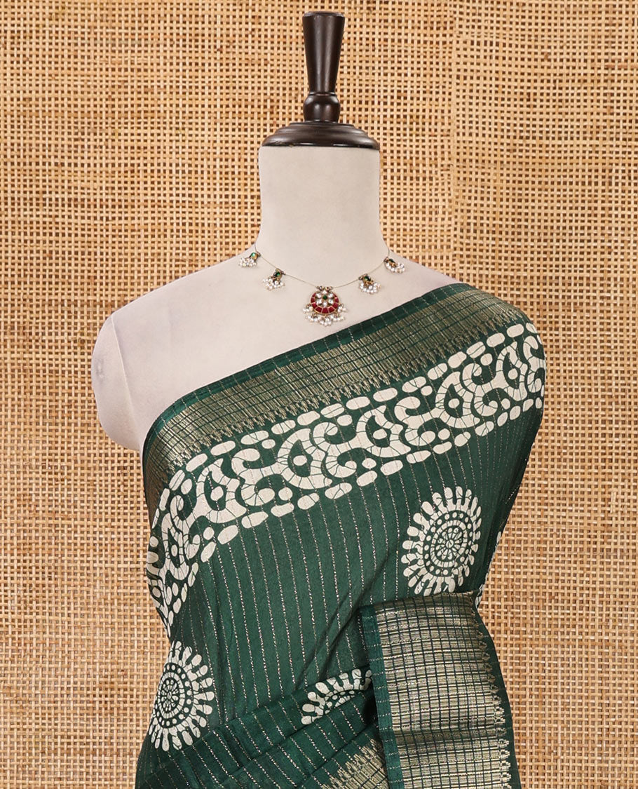 Green golden zari striped & batik-printed dola silk saree, traditional zari border & batik printed pallu & matching batik printed blouse