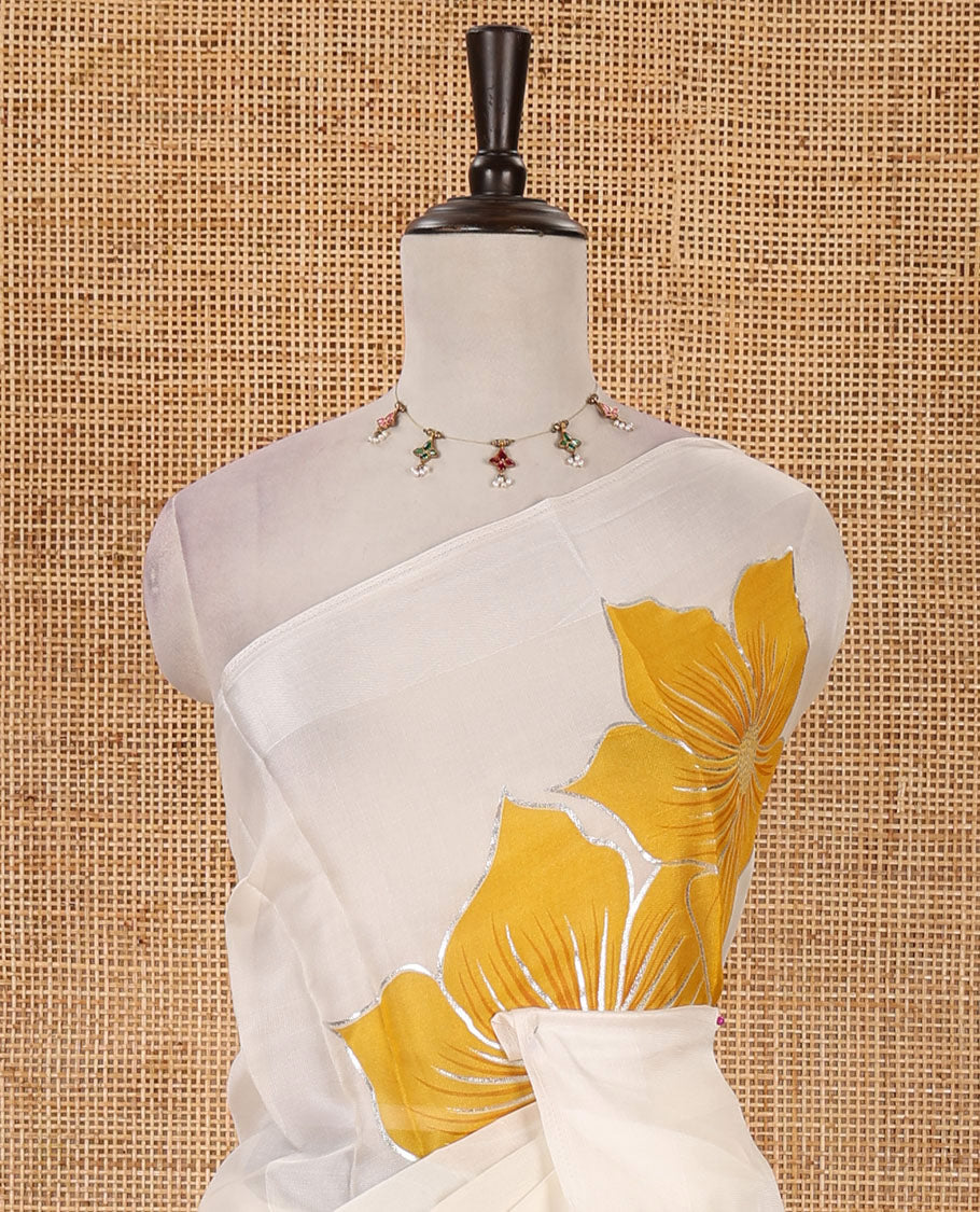 Cream floral placement-style printed Marble chiffon saree, zari border & contrast yellow gotta patti work & mixed embroidered blouse