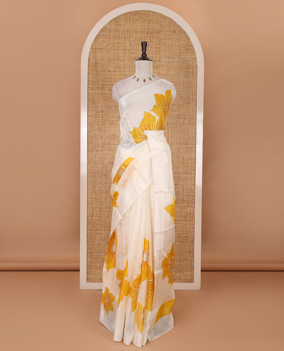 Cream floral placement-style printed Marble chiffon saree, zari border & contrast yellow gotta patti work & mixed embroidered blouse