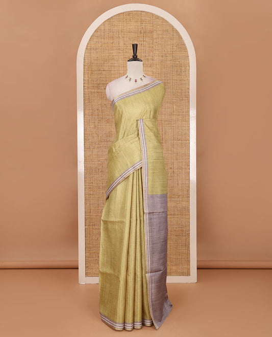 Sea green full-plain design semi-tussar saree, contrast thread triangle motifs border, bird motifs printed pallu & contrast striped blouse