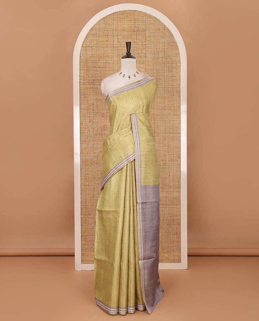 Sea green full-plain design semi-tussar saree, contrast thread triangle motifs border, bird motifs printed pallu & contrast striped blouse