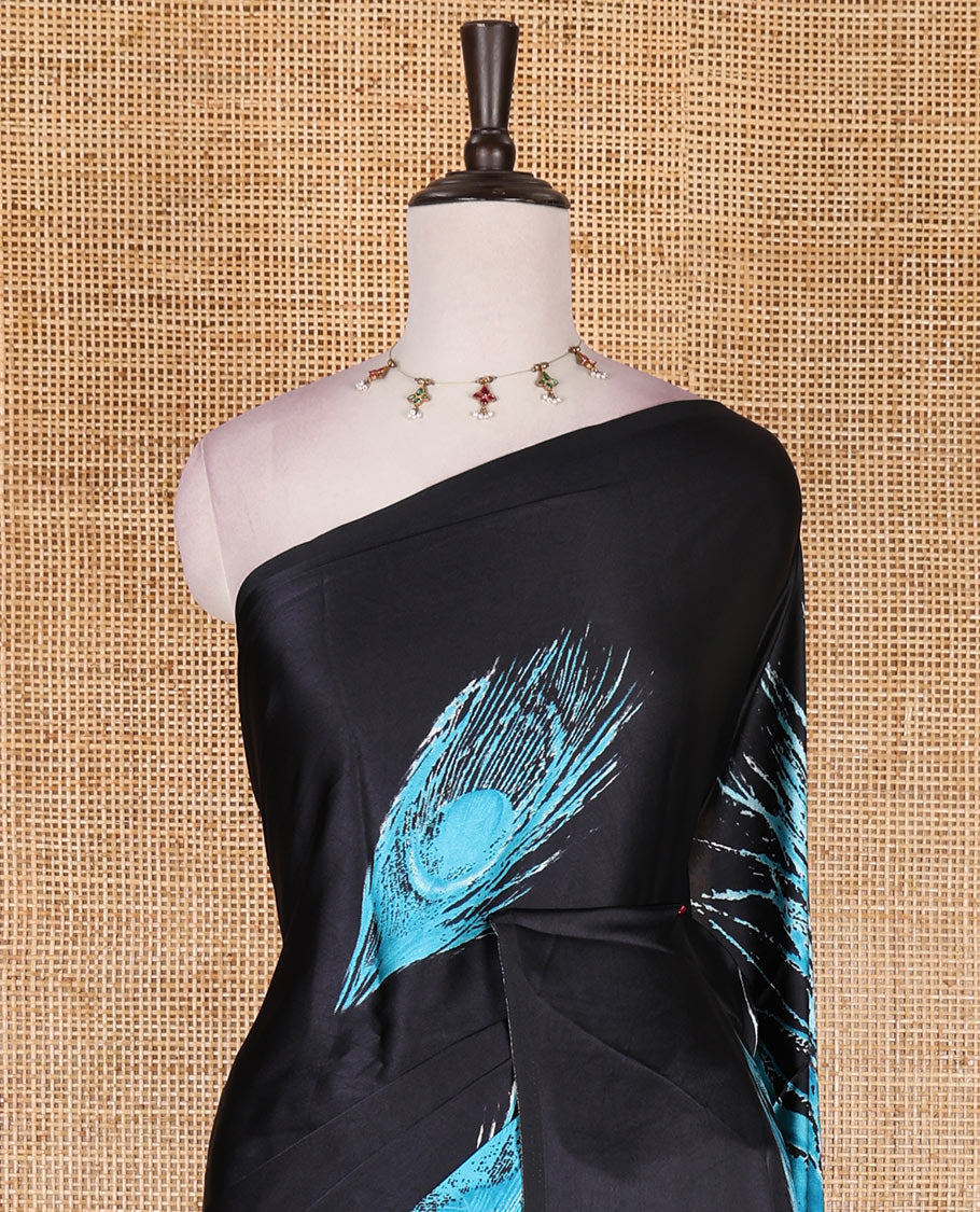 Borderless black and blue  peacock feather-like abstract printed satin crepe saree, peacock feather-like abstract print pallu, and abstract print blouse