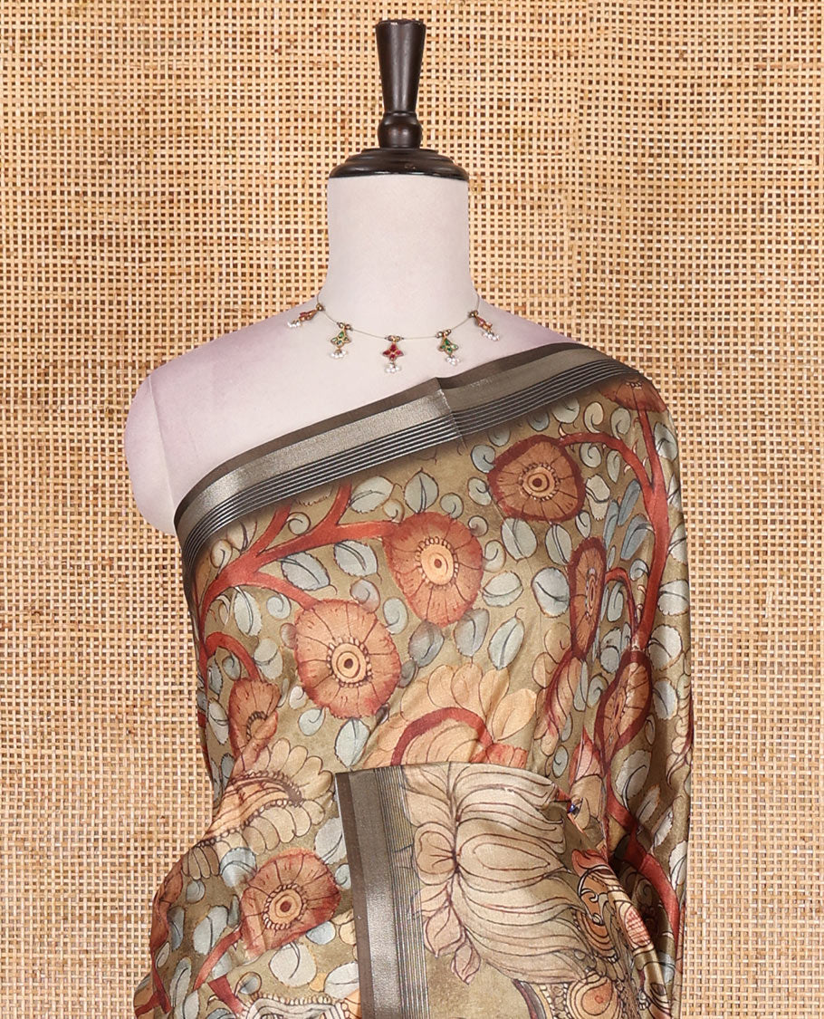 Light green kalamkari elephant, peacock, and floral printed semi-tussar saree, zari piping border, kalamkari motifs printed pallu, and contrast printed blouse