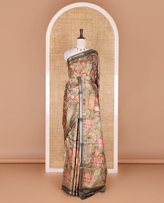 Light green kalamkari elephant, peacock, and floral printed semi-tussar saree, zari piping border, kalamkari motifs printed pallu, and contrast printed blouse
