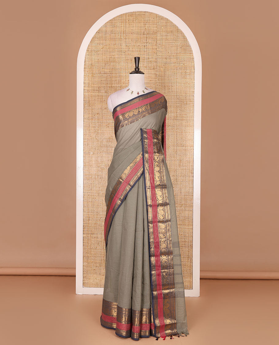 Light grey plain Chettinad cotton saree, contrast rettai rettu annam and temple motif zari border, striped pallu, and matching blouse