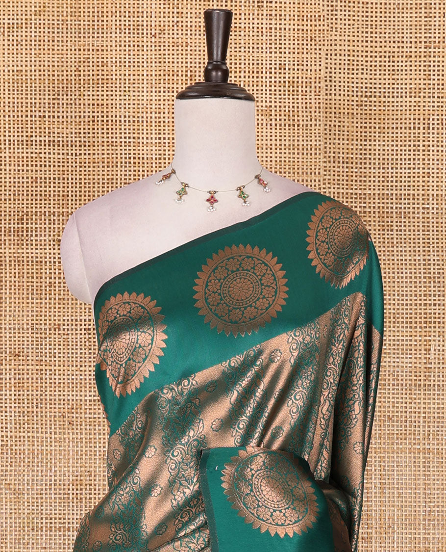 Green jacquard kanchi tissue saree, zari chakram motifs border, intricately zari woven pallu, and a matching zari design blouse