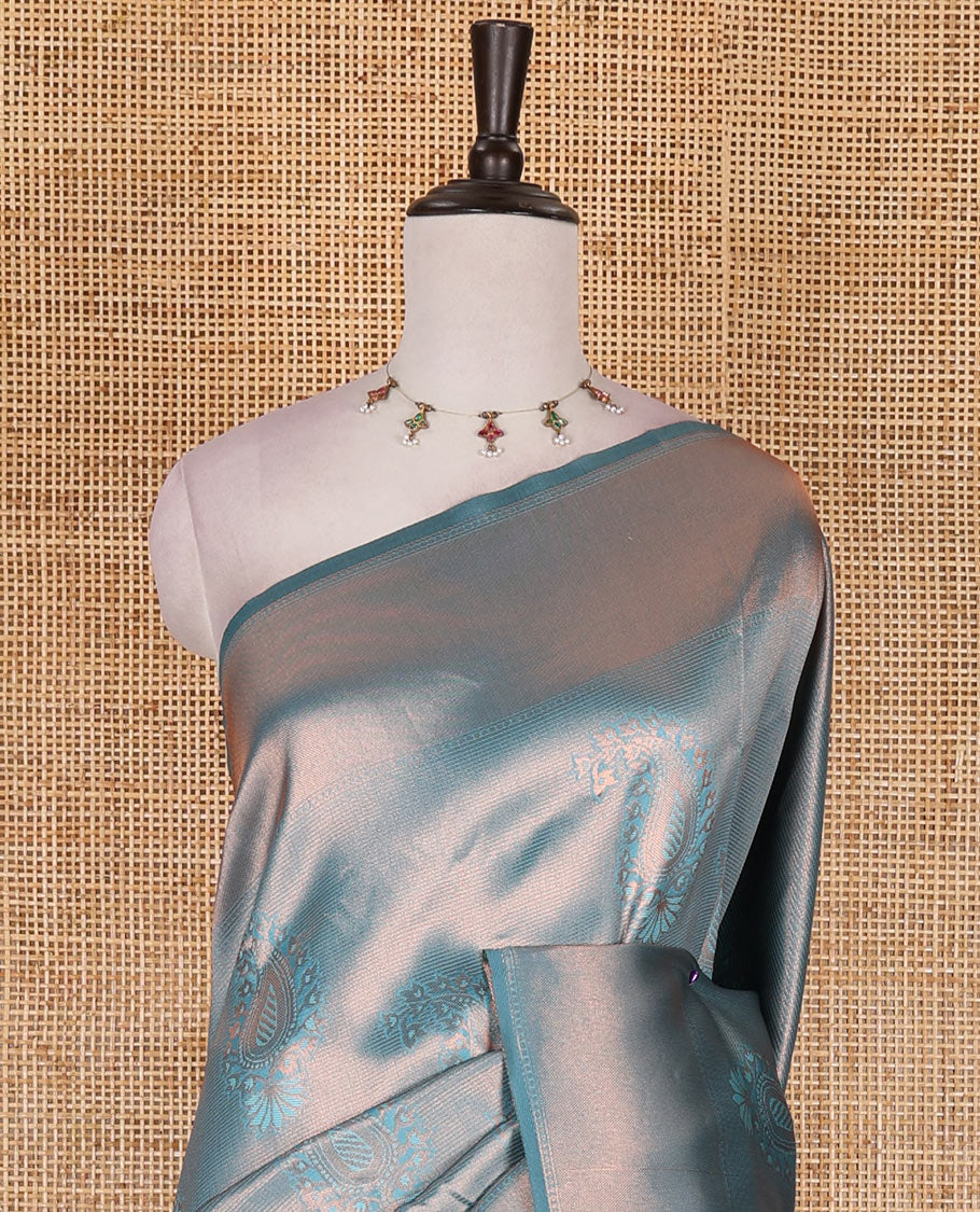 Light blue paisley zari jacquard Kanchi tissue saree, zari border, pallu steeped with paisleys, and jacquard matching blouse