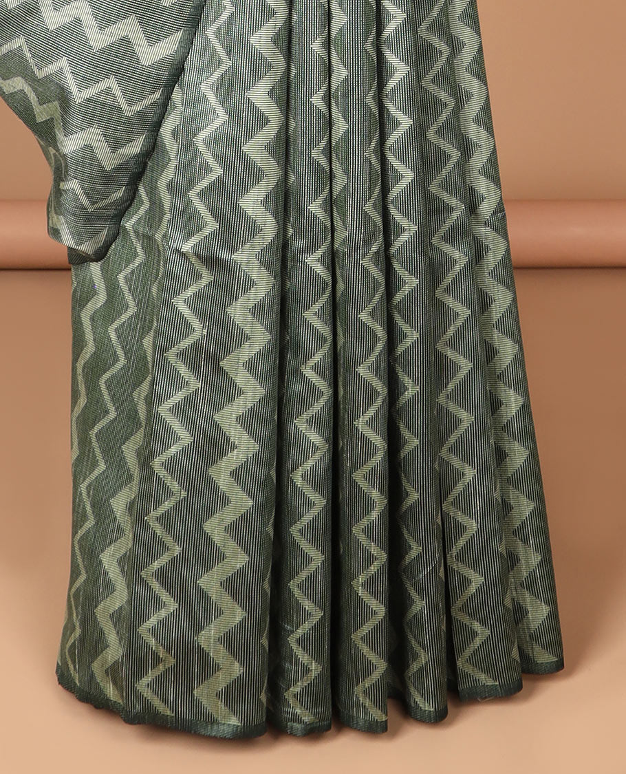 Borderless dark green kicha zig zad design semi jute saree with plain pallu & lining blouse