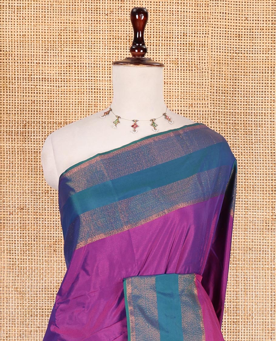 Violet plain semi-soft silk saree, contrast zari striped border, striped pallu, and matching blouse