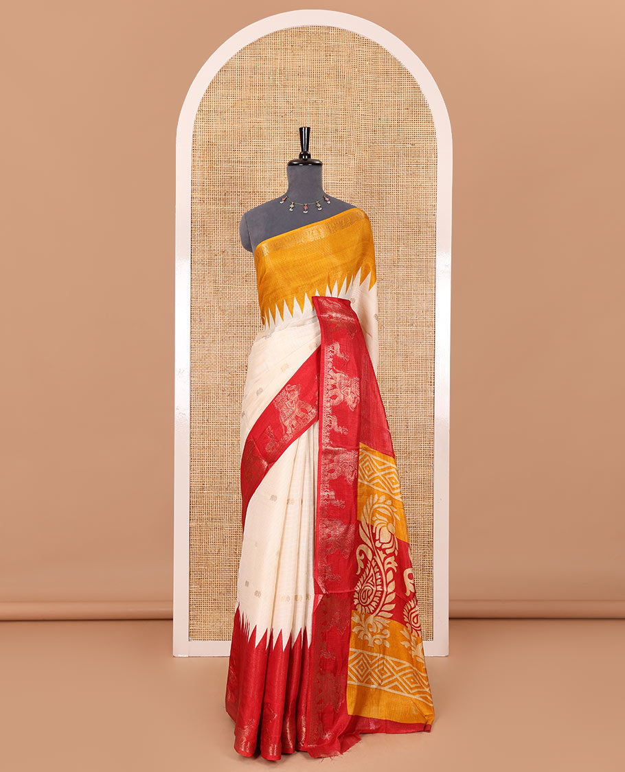 Half-white zari stripes and buttas dola silk saree, contrast red-orange Ganga-Jamuna temple elephant motifs border, paisleys printed pallu, and contrast elephant buttas blouse